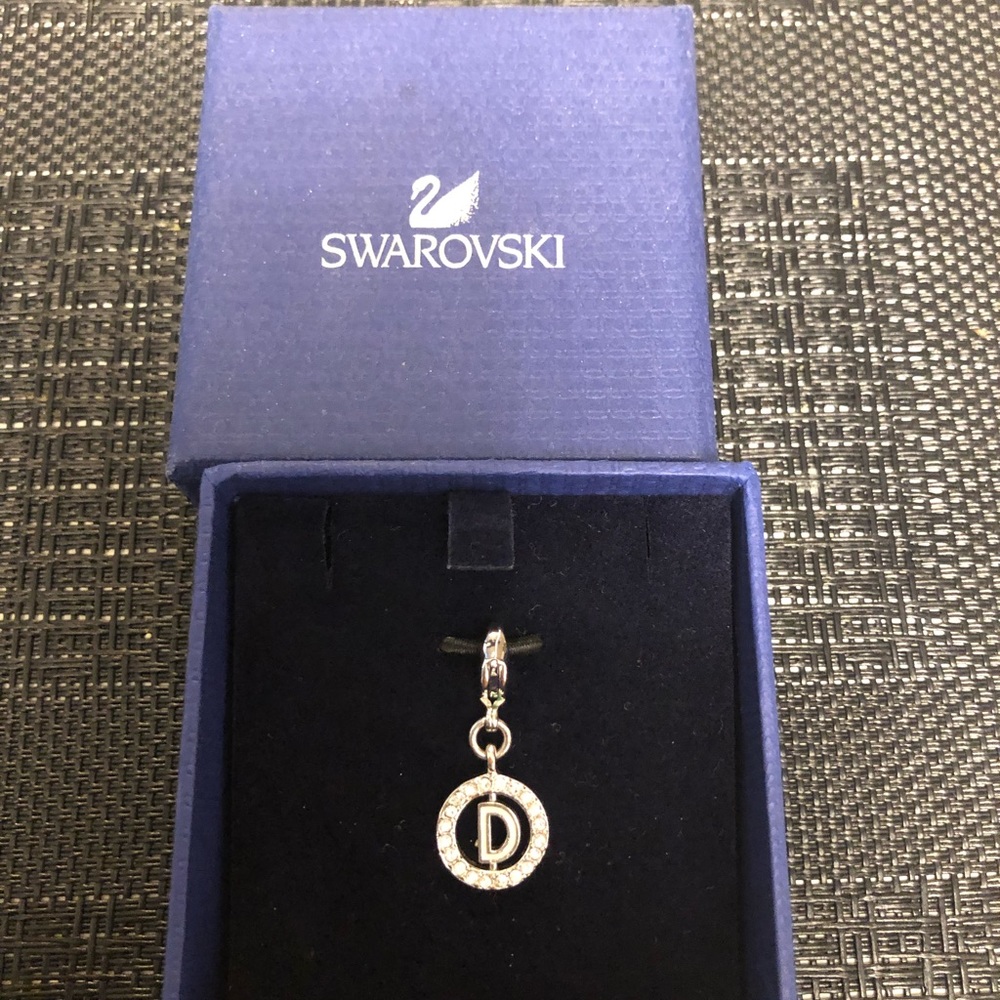 Swarovski initial “D” zipper pull.